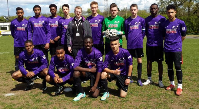 Football team photo in purple college kit