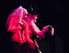 Hair show models in pink and black corsets