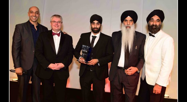 College principal with college-sponsored award winners