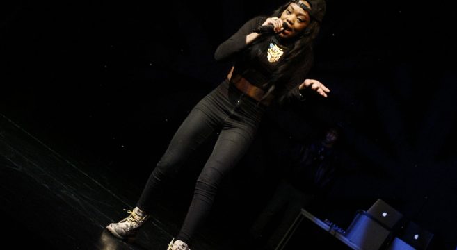 Lady Leshurr rapping on stage