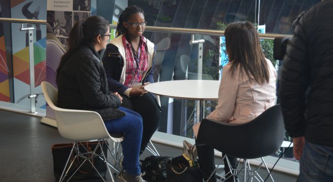 Students being interviewed by news presenter