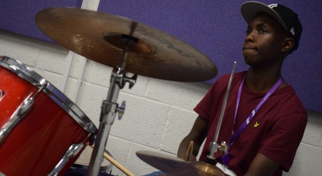 Student on drums