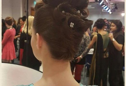 Picture of the back of the head of the recipient of Britain's Best winner 2016 glamorous evening style