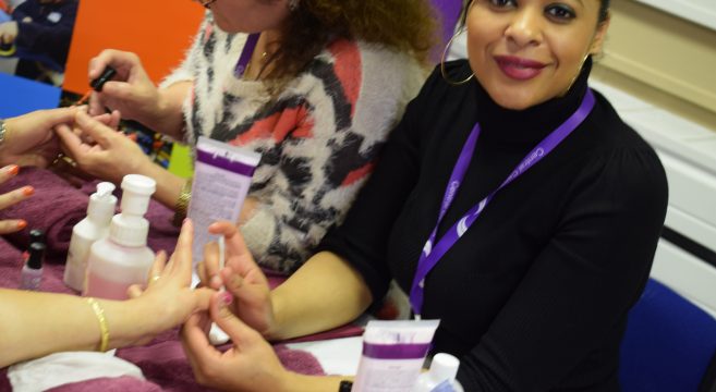 Beauty staff member providing skin care treatment at Jubilee Community Centre