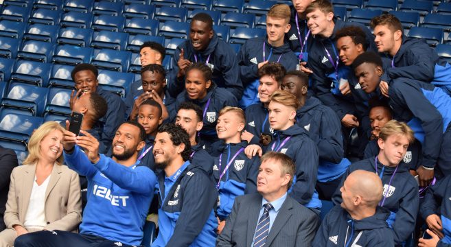 Sports students pictured with West Bromwich Albion players and Sandwell College staff members