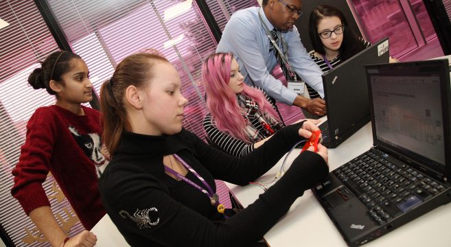 Group of students using their computer