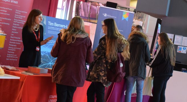 Group of students at Sixth Form Expo 2018 speaking to Staffordshire University representative