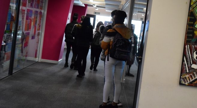 A Level students walking down a corridor