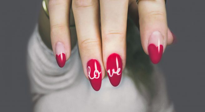 Red painted finger nails