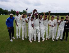 Cricket team celebrating trophy win