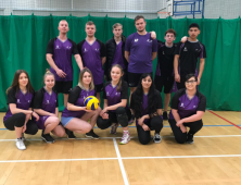 Group of male and female volleyball players
