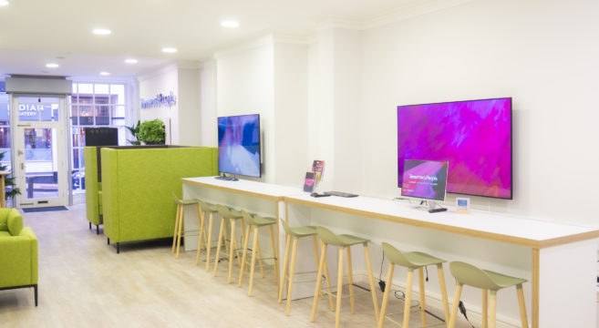 ground floor of bennetts hill with high tables and chairs