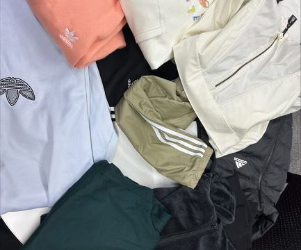 A pile of Adidas clothing