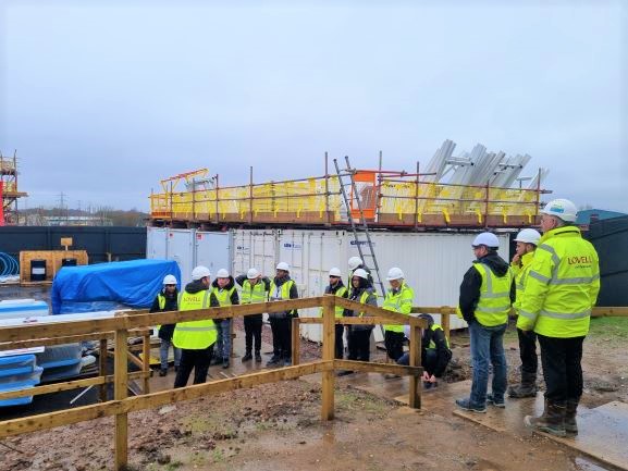 CONSTRUCTION LEARNERS ON SITE WITH LOVELL