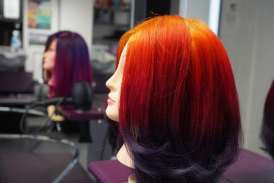 Brightly coloured hair mannequins