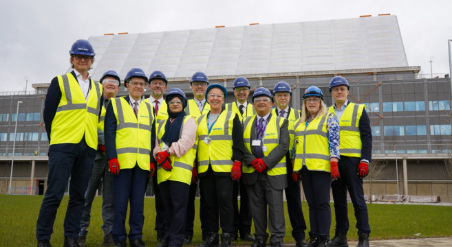 Stakeholders of the new midland met stood in front of the site