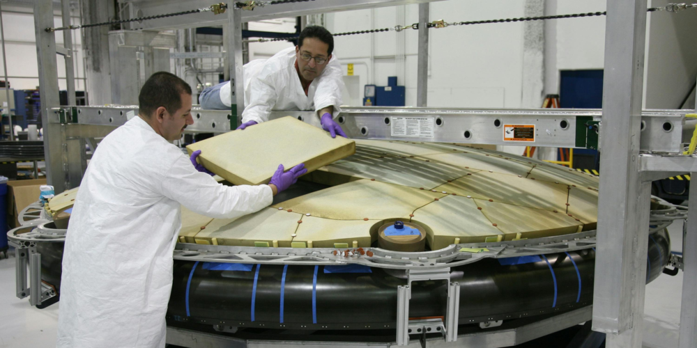 Two engineering working on a space project