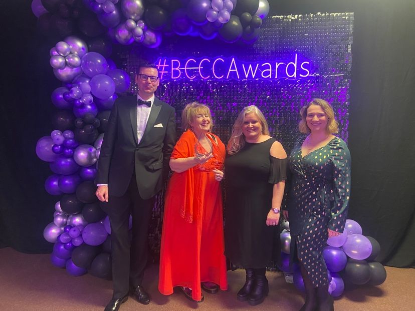 Award winning staff holding trophy at BCCC Awards