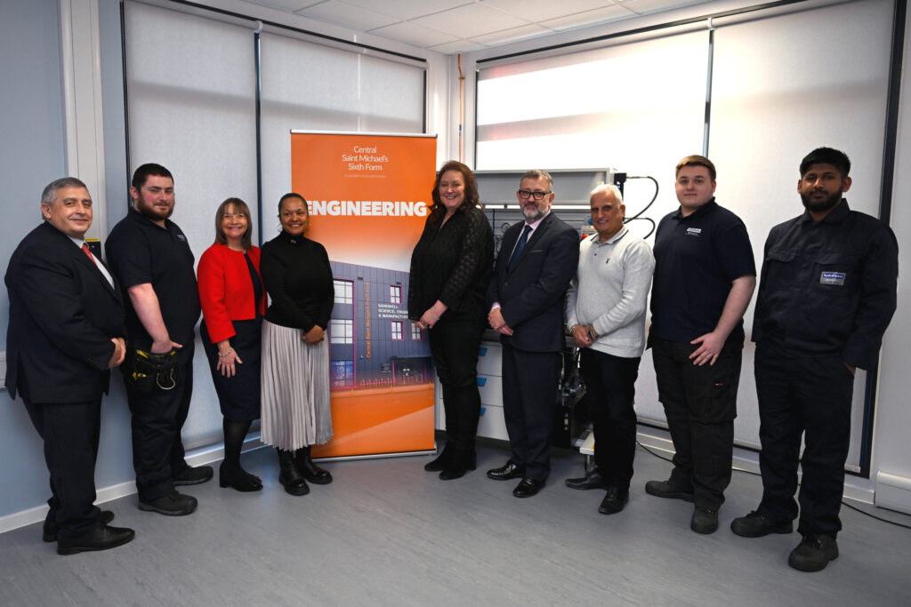 Principal with external partners and students at first anniversary of launch of engineering centre