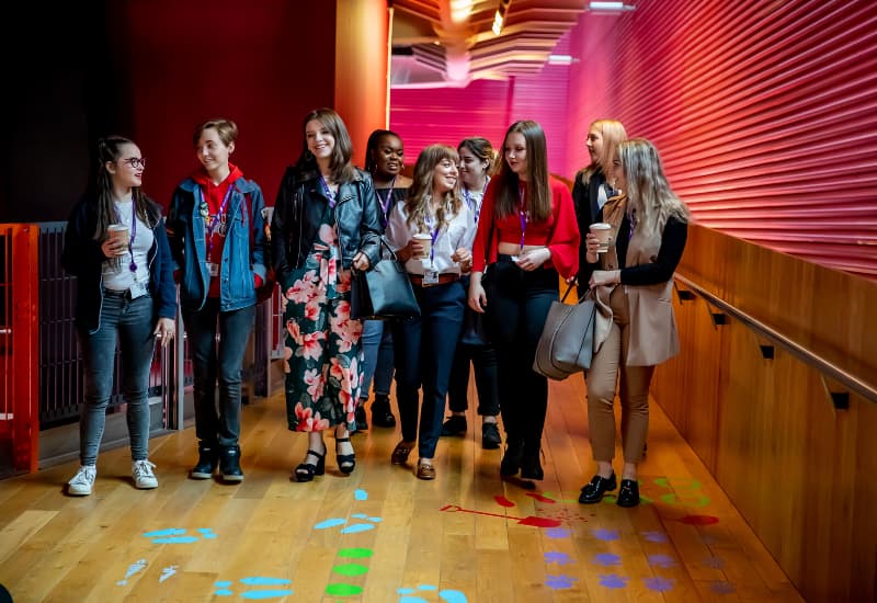 Group of students walking down ramp at Central Saint Michael's