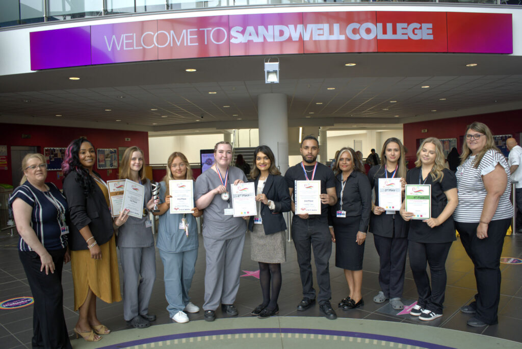 Hair & Beauty winners with certificates and staff