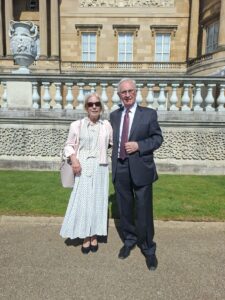 John Tew and his wife at Buckingham palace Garden Party