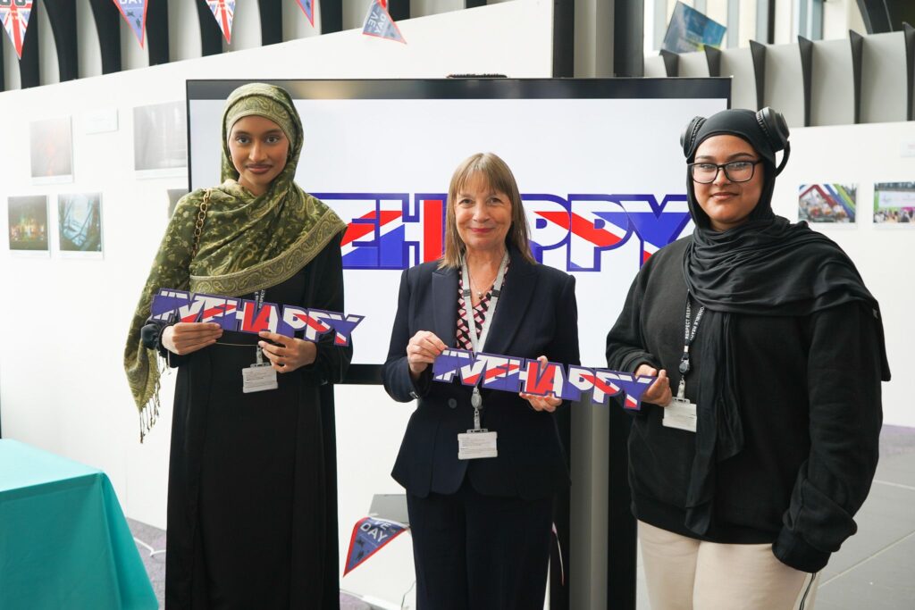 Lisa Capper MBE with students and staff at VE Day Celebration