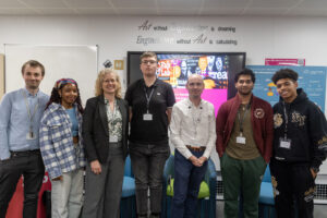 T Level computing students and Matthew Sanders smiling after Q&A session