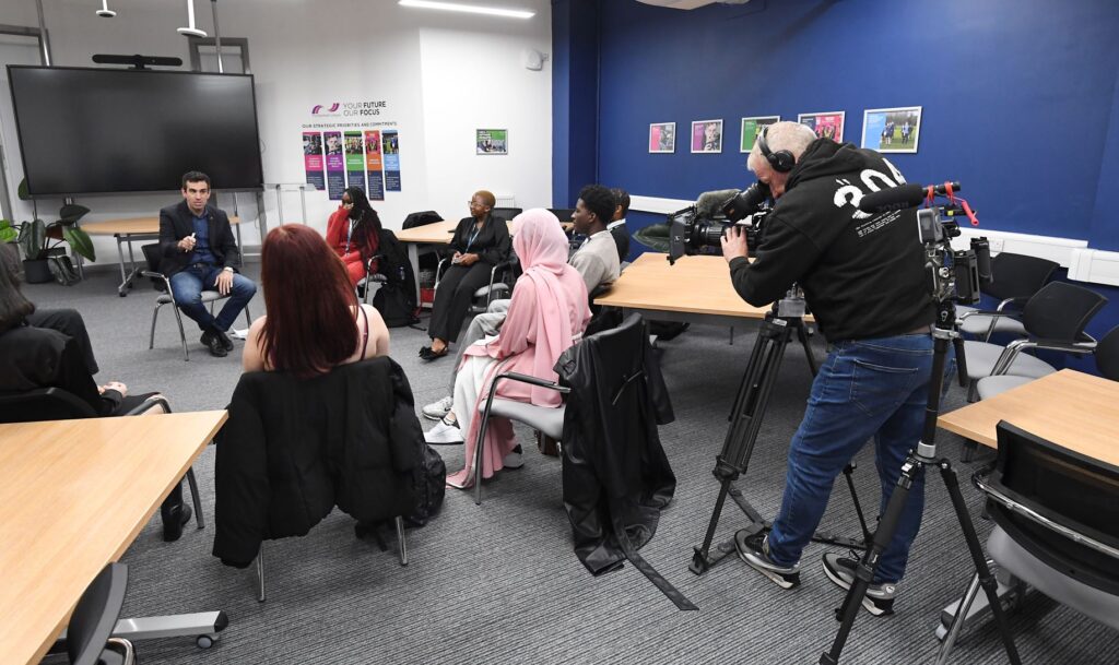 BBC presenter Ben Godfrey interviewing students