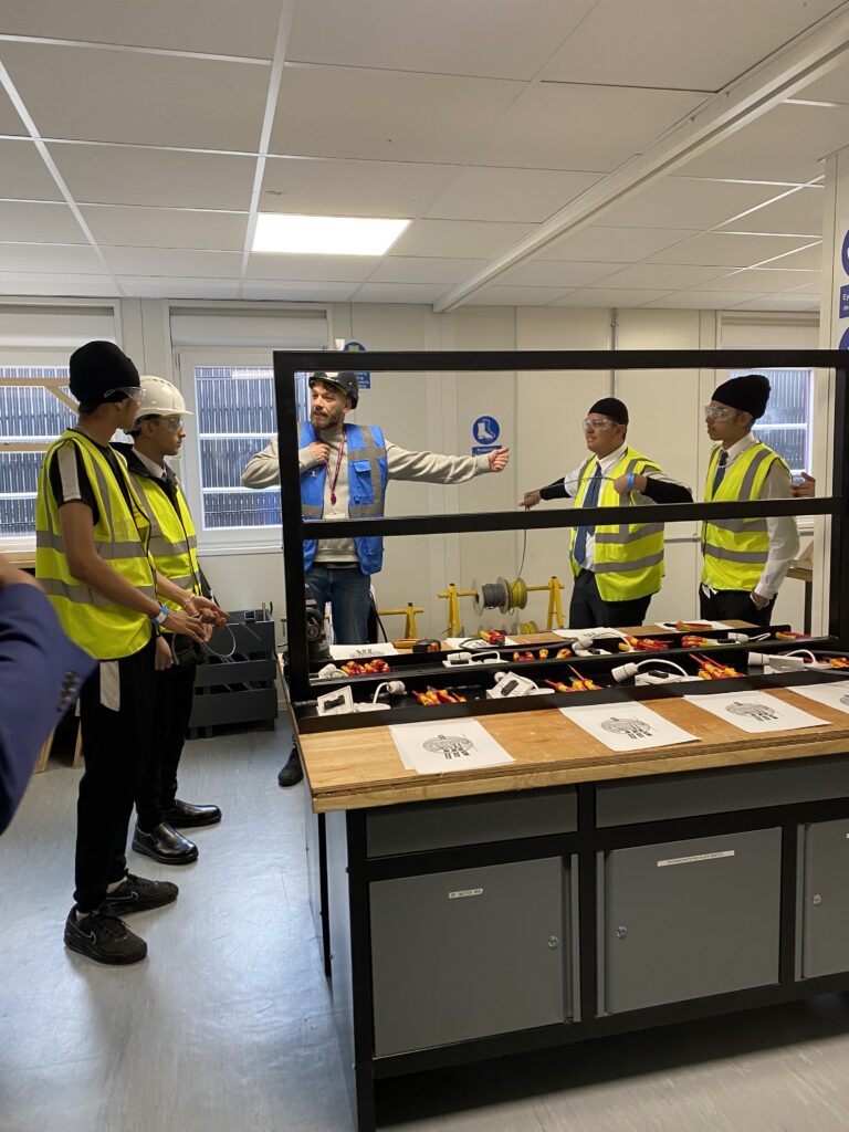 Engineering lecturer demonstrating to students