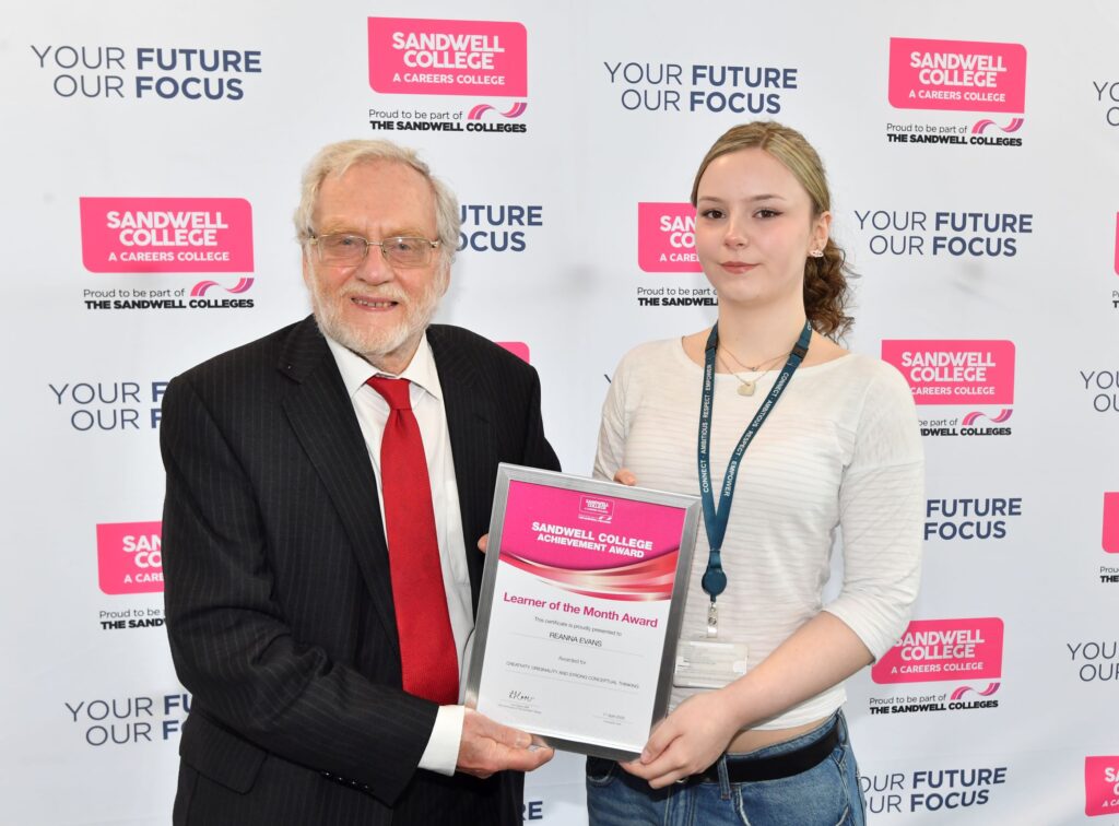 Learner of the Month award winner presented with her certificate by Lord Spellar