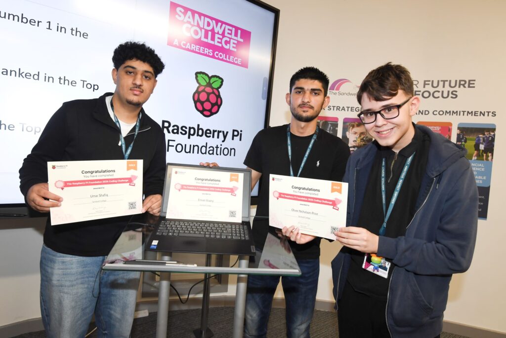 Three winners of the Raspberry Pi challenge with their certificates