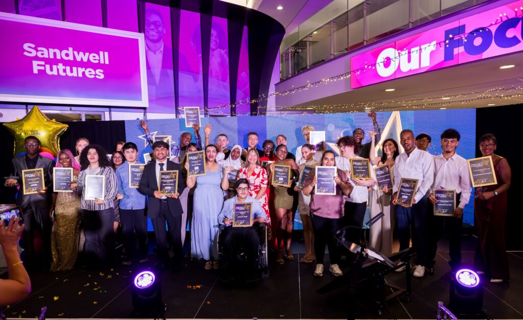 Award winners gather on stage at the Celebrating Excellence ceremony