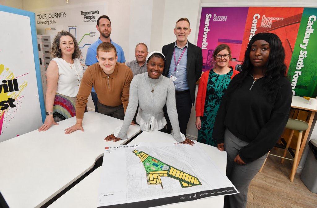 Work experience students with college manager and company representatives